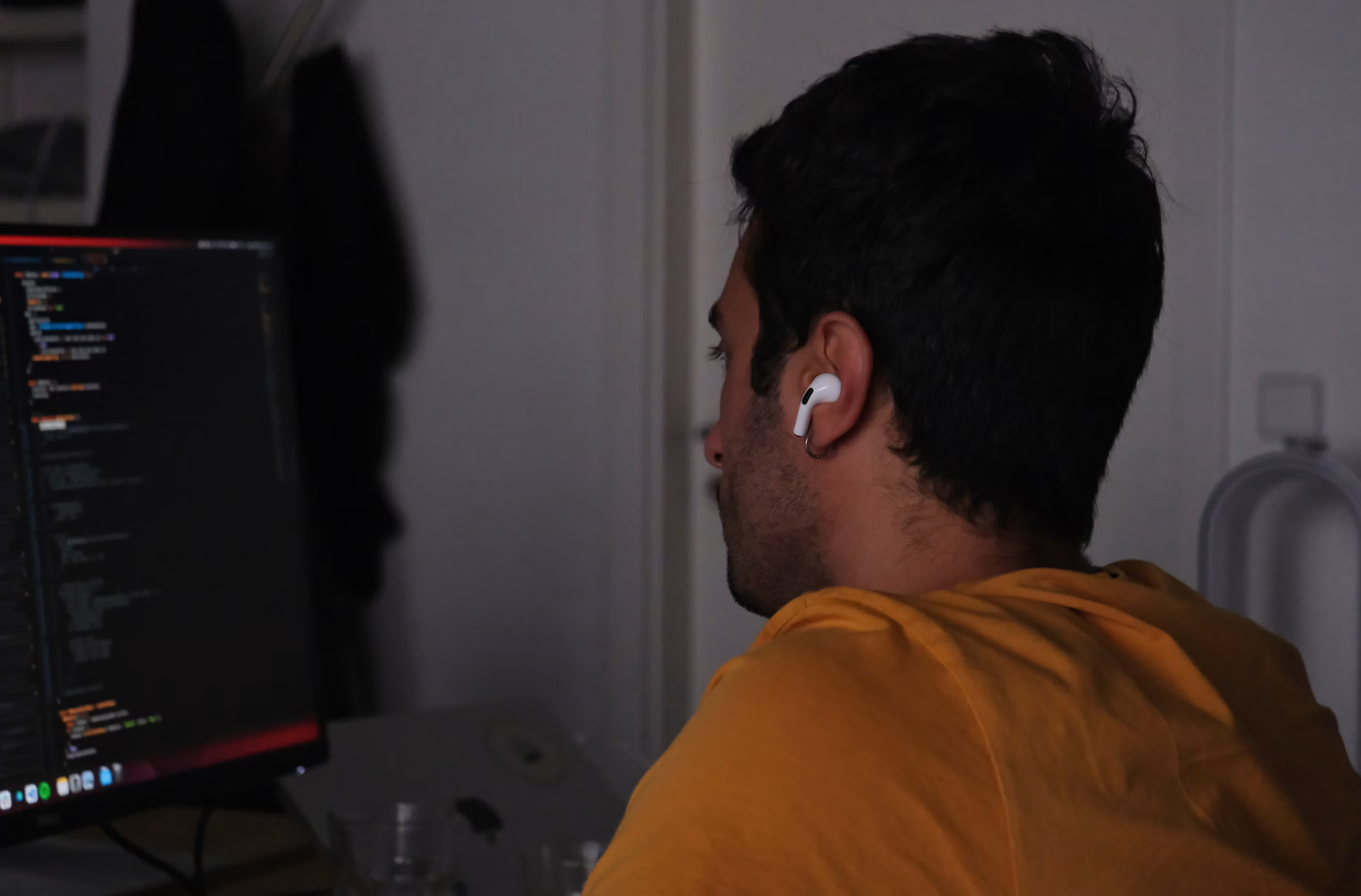 AuroraSpace engineer delivering software at a workstation